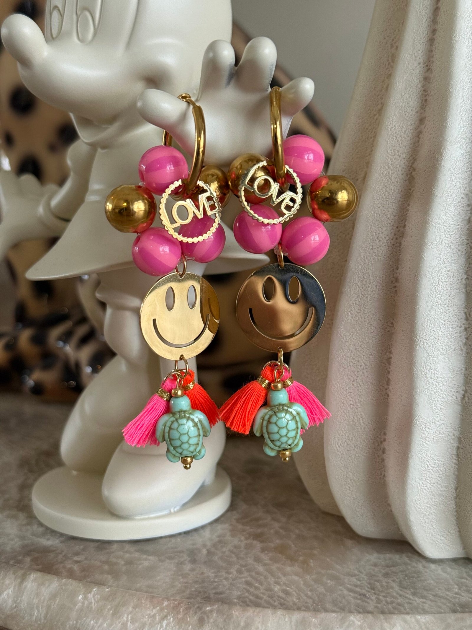 By M oorbellen roze smiley’s en schildpad