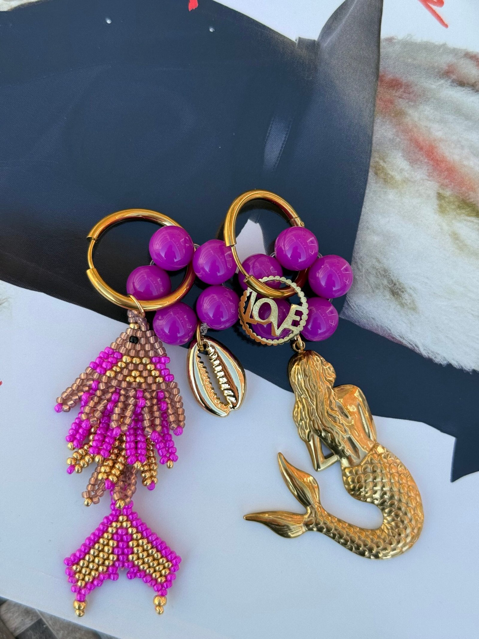 By M zeemeermin oorbellen magenta