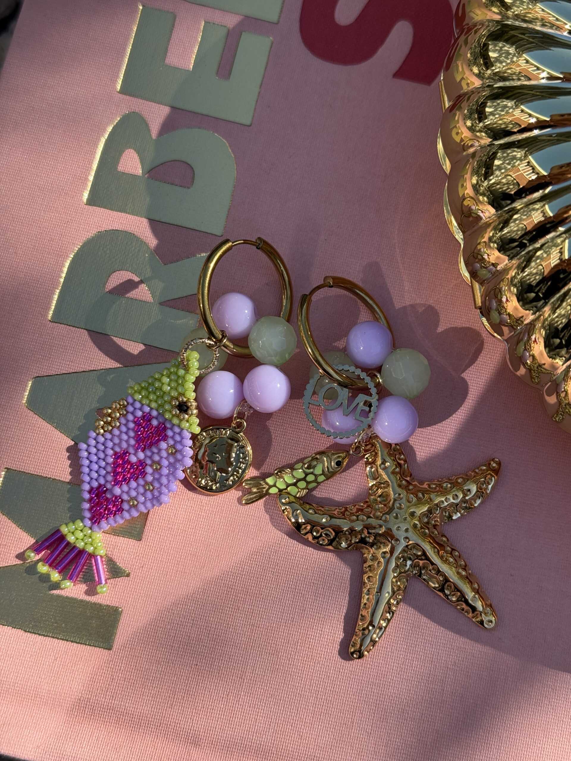 By M oorbellen zeester vis lila groen