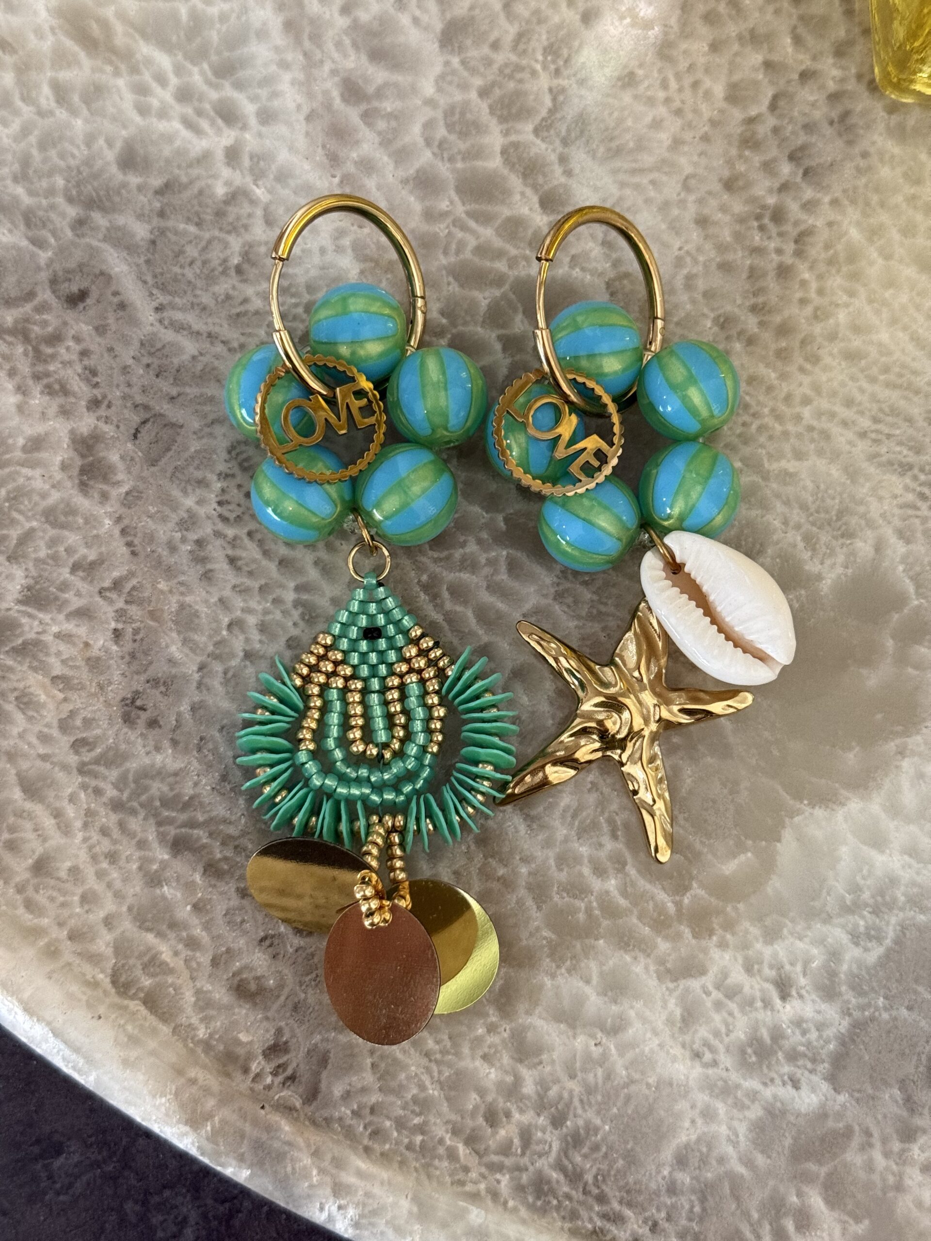 By M oorbellen turquoise vis zeester en schelp