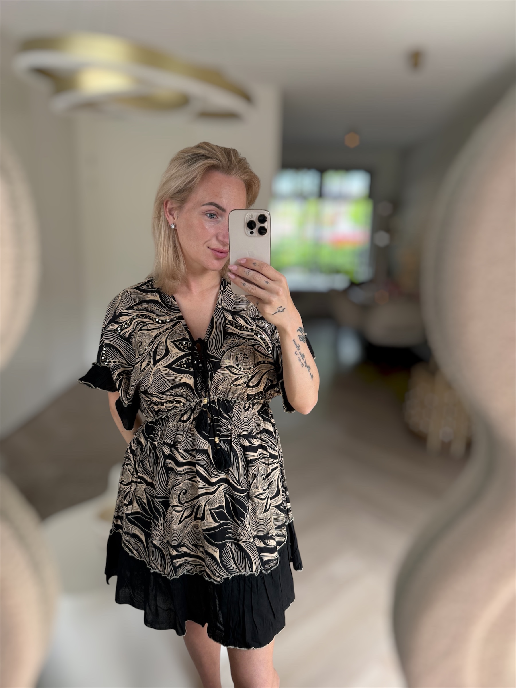 Jurkje goud zwart met pailletjes